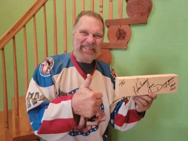 Autographed wooden 2x4