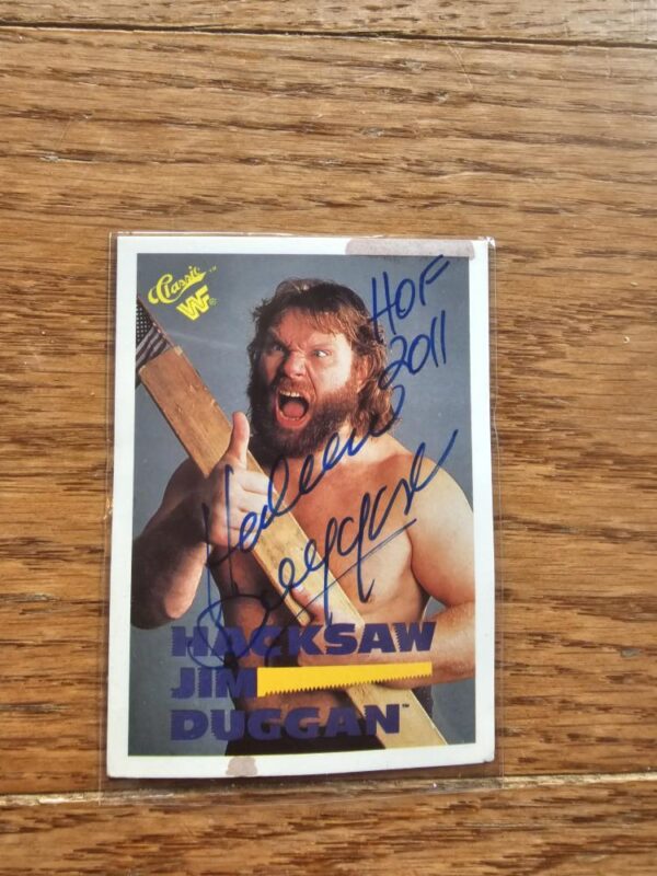 WWF Hacksaw with 2x4